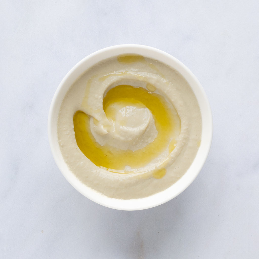 mamoosh creamy hummus in a bowl