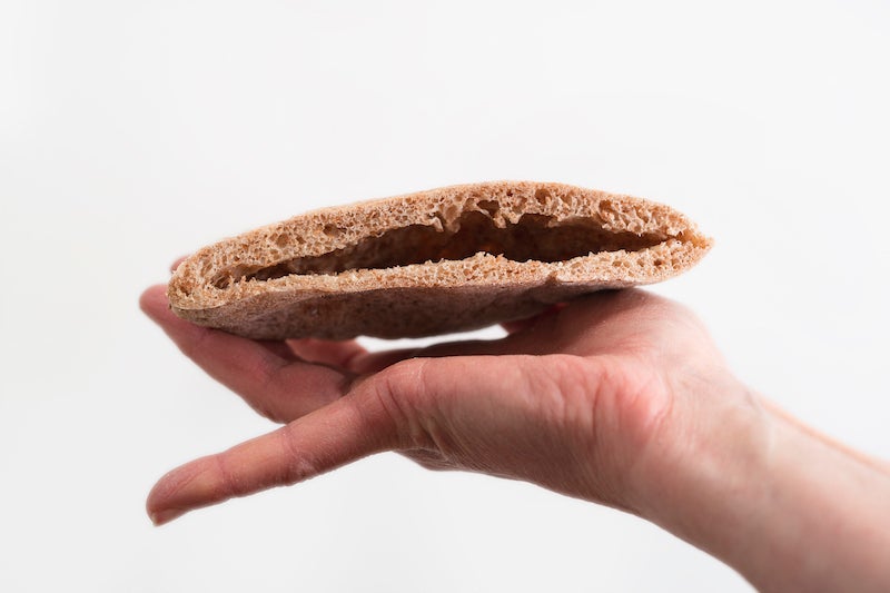 wholemeal pitta cut in half
