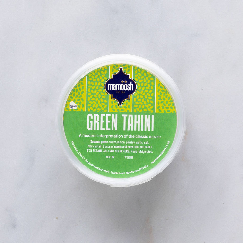 green tahini dip in mamoosh packaging