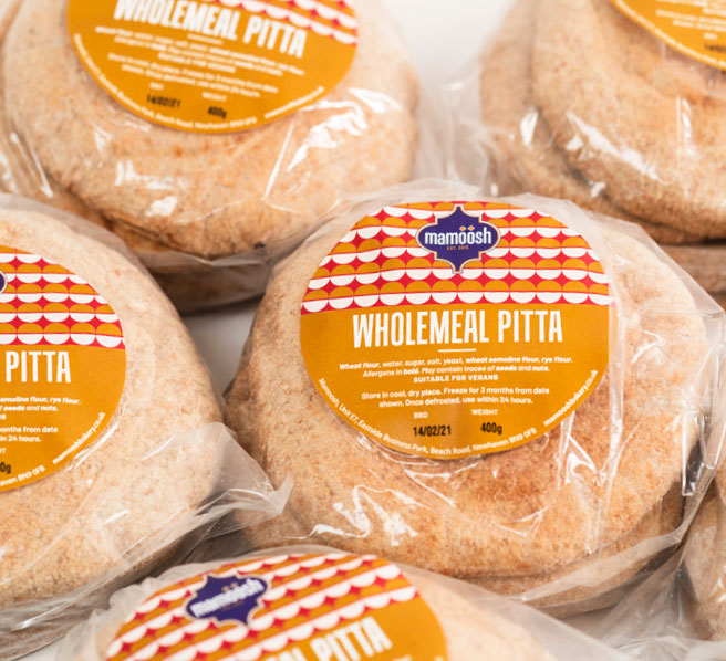 
                  
                    Wholemeal pitta packs labelled
                  
                